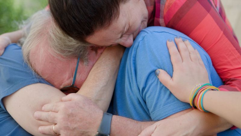 Holding Liat Backdrop Image