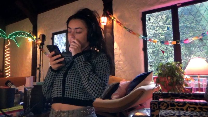 Charli XCX: Alone Together Backdrop Image